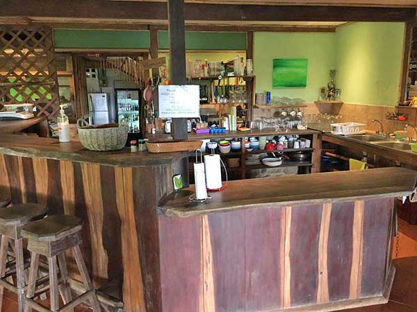 The bar and shared kitchen at Cascada Verde, family hostel by the waterfall in Uvita, Costa Rica